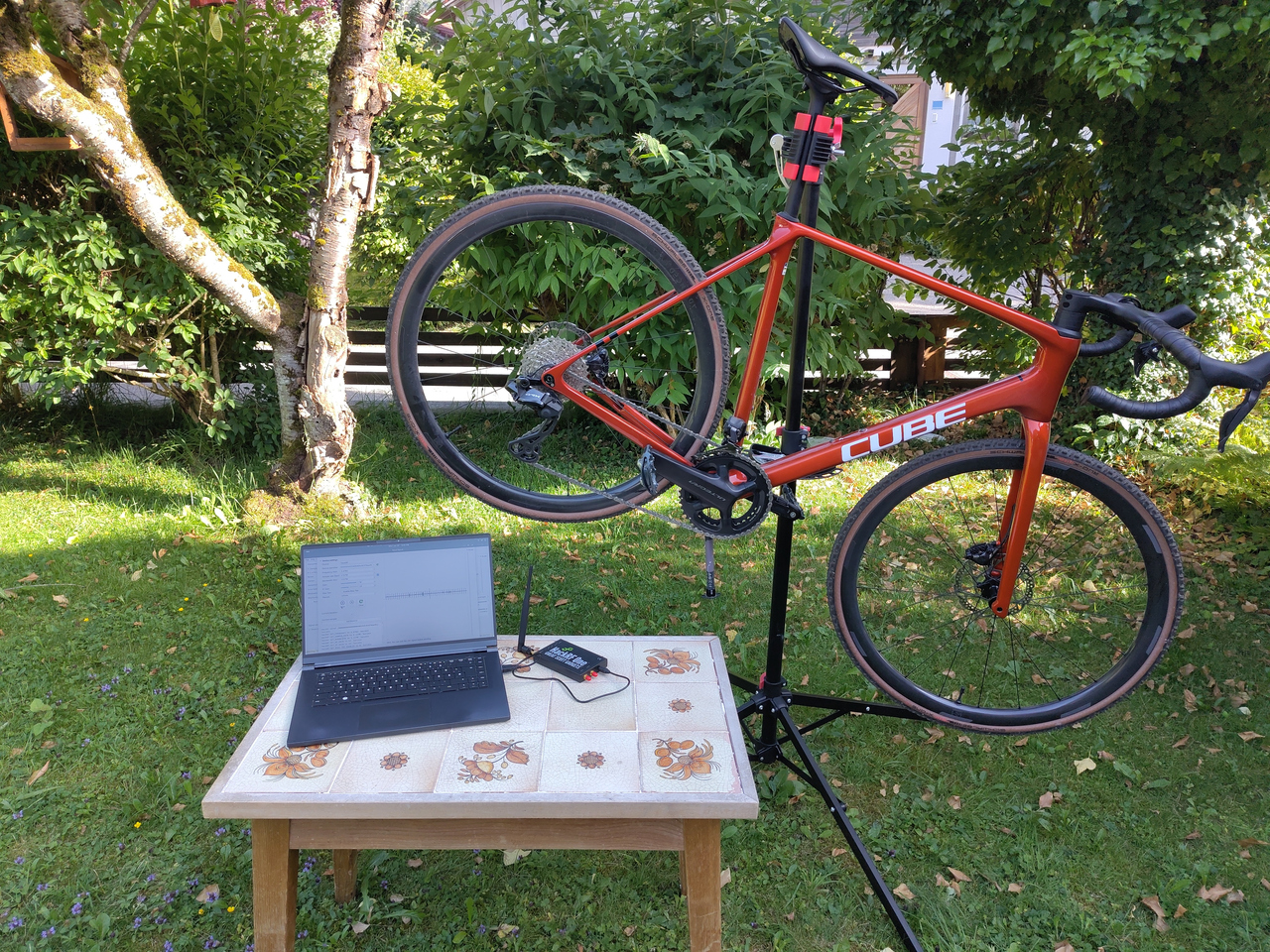 Picture of the setup with the bicycle in a stand and my laptop with the SDR